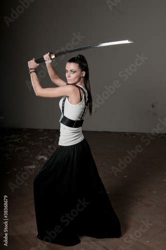 Woman Wielding Traditional Sword Buy This Stock Photo And Explore