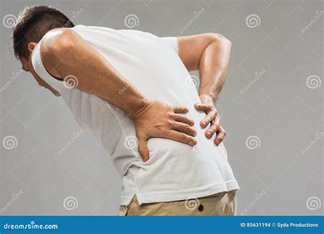 Close Up Of Man Suffering From Backache Stock Photo Image Of Ache