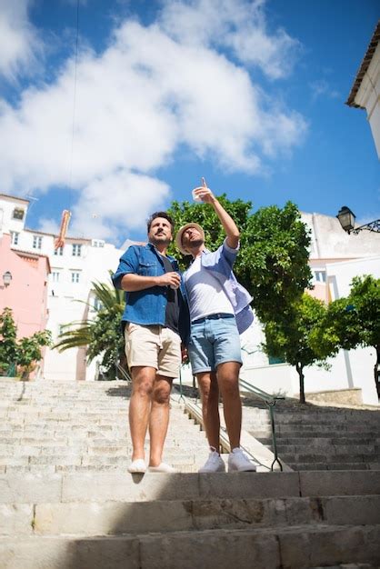 Premium Photo Glad Gay Men Having Vacation In Europe