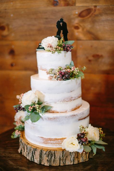 We love pinecones so much we have a pinterest board dedicated to pinecone wedding ideas. Rustic, Berry and Eucalyptus-Accented Cake | Lisa ...