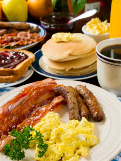 What Is Complimentary Breakfast In Hotels Is It Free Piled Plates