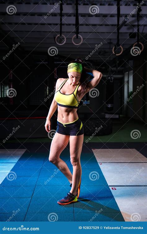 Beautiful Strong Slender In Good Physical Shape In The Gym Doing