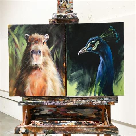 Two Paintings Of Animals On Easels In An Art Studio