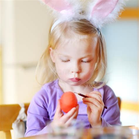 Adorable Little Girl Painting Colorful Easter Eggs Stock Photo Image