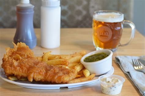If possible can we order before service begins like this it is easier to respond ,( ie my hands not in batter mix). Proper British Fish & Chips and a pint of Boddingtons ...
