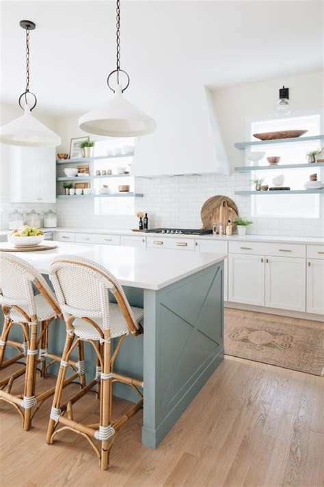 The farmhouse dining table was a thrift store find. Coastal Farmhouse Dream Home Tour - Sand and Sisal