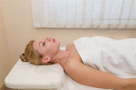 Woman Lying In Spa Salon With Closed Eyes Waiting For Massage Stock Image Image Of Attractive