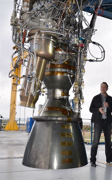Elon Musk Standing Next To The 100th Merlin 1d Rocket Engine Produced