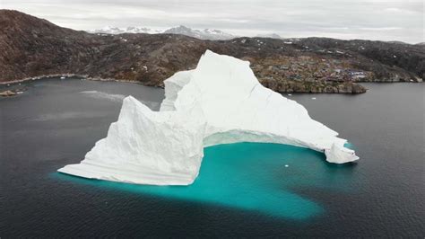 A Huge Iceberg Is Threatening A Tiny Village In Greenland Cnn