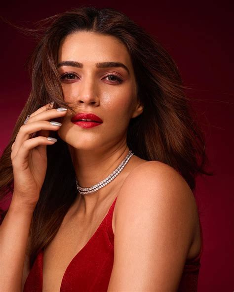 photo gallery actress kriti sanon stunned in a red deep neck dress see her sizzling pics