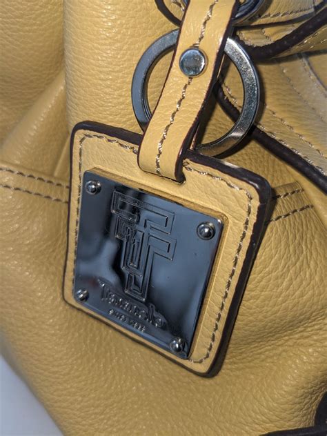 Great Finds Online Auctions Tignanello Leather Purse