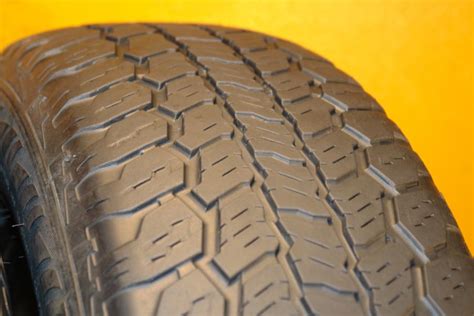 Outlined white letter or black sidewall depending on the tire's size; 245/70/17 TRAIL GUIDE