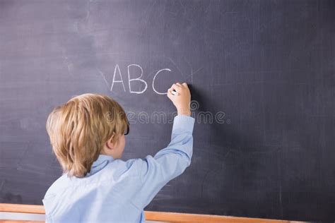 Student Writing On Large Blackboard Stock Image Image Of Pupil