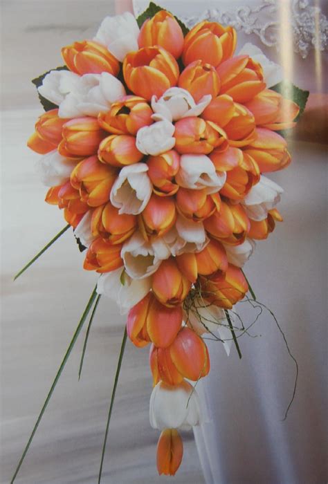 Different tulip colours represent different meanings. Teardrop | White tulip bouquet, Wedding flowers, Unique ...
