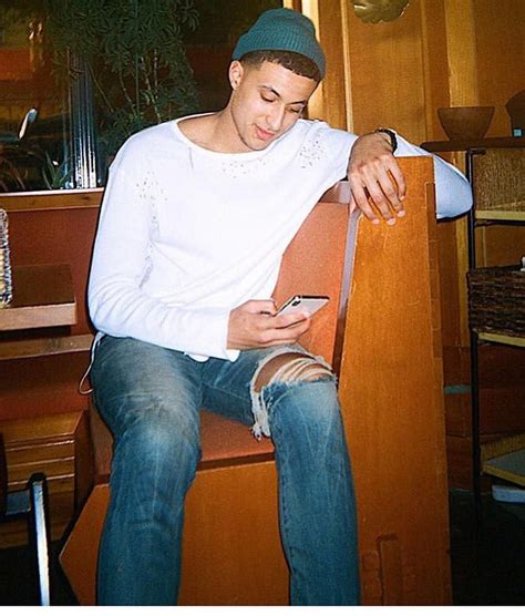 Image May Contain Person Sitting Shoes And Indoor Kyle Kuzma