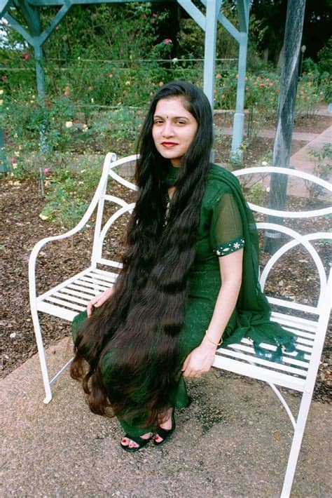 Smiling woman in traditional clothing. longhairgirls: Very long hair indian women