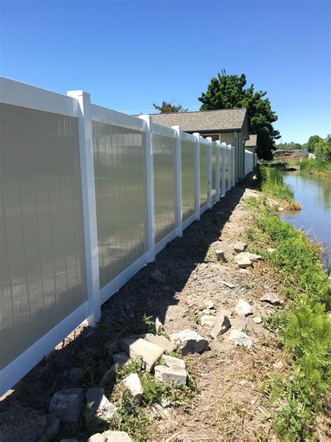 White polycomposite rail kit with black metal balusters. vinyl fence - Meridian Fence