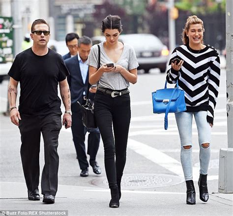kendall jenner rocks colorful aviators and a plunging t shirt in nyc daily mail online