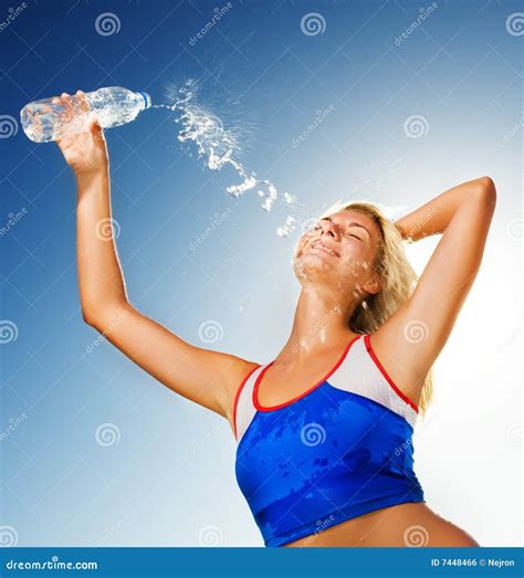 Woman Drinking Water After Fitness Exercise Royalty Free Stock Image