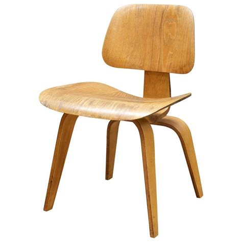 Sourcing guide for eames plywood lounge chair: 1948 Charles Eames Evans Bent Plywood Herman Miller Dining ...