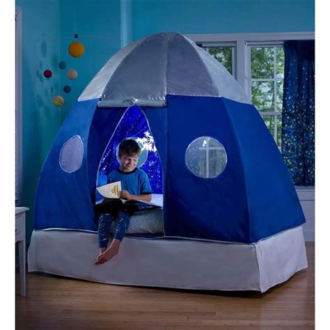 Hearthsong galactic space bed tent playhouse electric interior starburst led light with ul connection 2 doors 4 windows fits twin size mattress 3 25 x 6 x 5 h blue silver. HearthSong - Galactic Bed Tent With Starburst LED Light, 4 ...