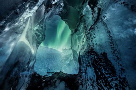 Northern Lights Aurora Borealis Over Glacier Ice Cave