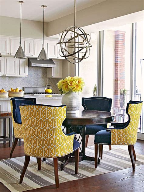 Classic slat back chairs and a turned pedestal table base give this. 10 Marvelous Dining Room Sets with Upholstered Chairs ...