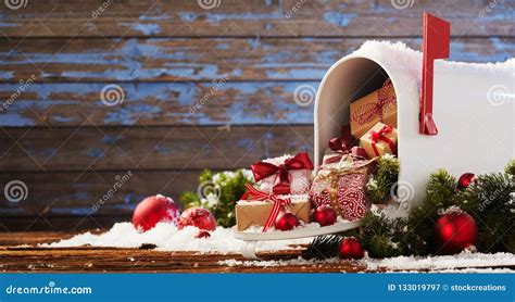 Mailbox Overflowing With Christmas Presents Stock Image Image Of