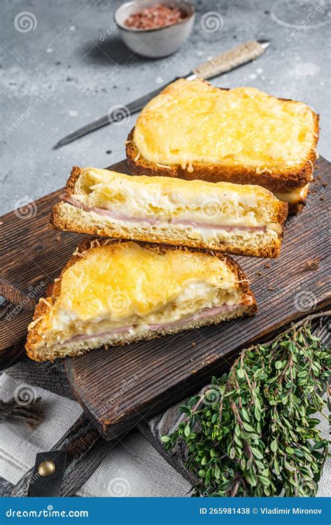 french croque monsieur sandwich with cheese ham gruyere and bechamel sauce gray background
