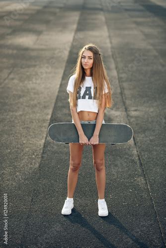 Cute Beautiful Teen Girl With Perfect Body In A White T Shirt Shorts