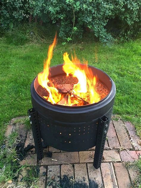 This build your own fire pit diy plan is one not to skip. Make Your Own Fire Pit With Just a Few Recycled Materials (With images) | Outside fire pits ...