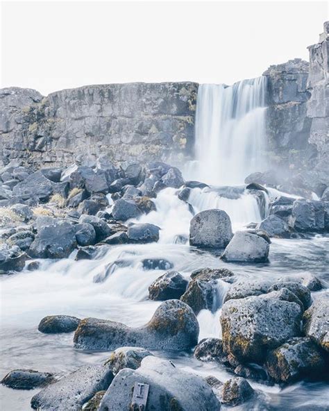 Öxarárfoss Waterfall In Þingvellir National Park Gushes Down A Steep