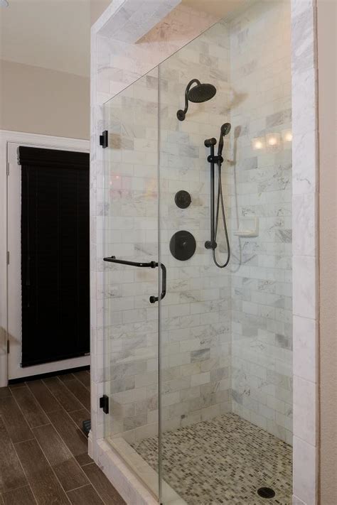 But don't call it safe. Timeless Glass-Enclosed Shower With Marble Tile | HGTV