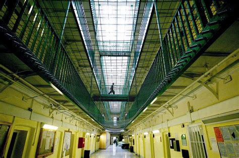 pentonville prison condemned by inspector for failing to let inmates in wheelchairs go outside