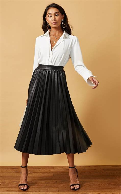 Black Pleated Midi Skirt In Coated Jersey Phoenix And Feather