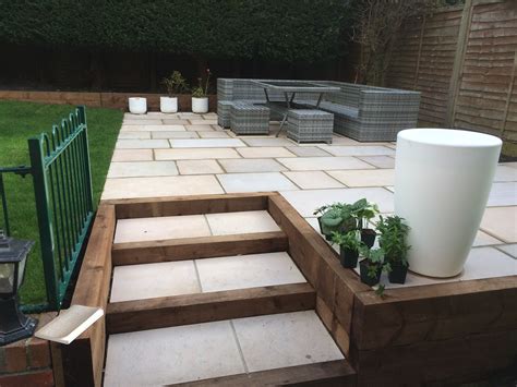 Raised Patio Area With Incorporated Steps Within Timber Frame Garden