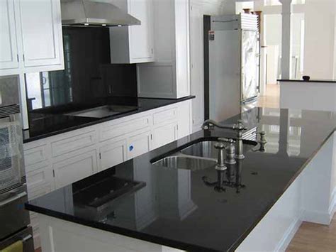Why granite countertops are still so popular. Backsplash Ideas for Black Granite Countertops @ The ...