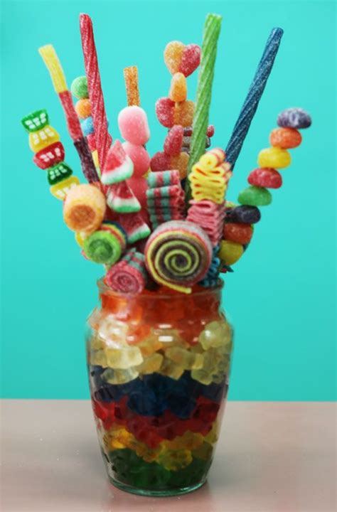 Maybe you would like to learn more about one of these? candy bouquet | Candy bouquet, Candy centerpieces, Candy cakes