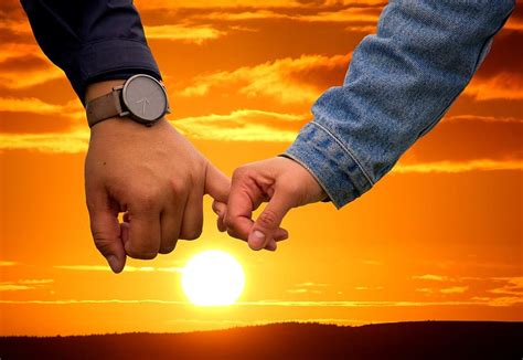 Lovers Holding Hands Sunset