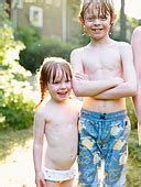 Wet Brother And Two Babe Standing In Garden Stock Photo Royalty Free Image Alamy