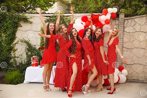 Polka Dot Birthday Party Group Of Female Friends Enjoying And Laughing