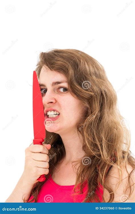 Woman Is Holding A Knife Close To Her Face Stock Photo Image Of Lady