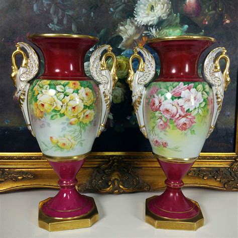 Pair of Limoges France antiques hand-painted vases, bolted base, with 