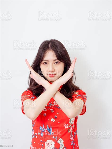 Portrait Of Young Asian Woman Wearing Traditional Cheongsam Qipao Dress