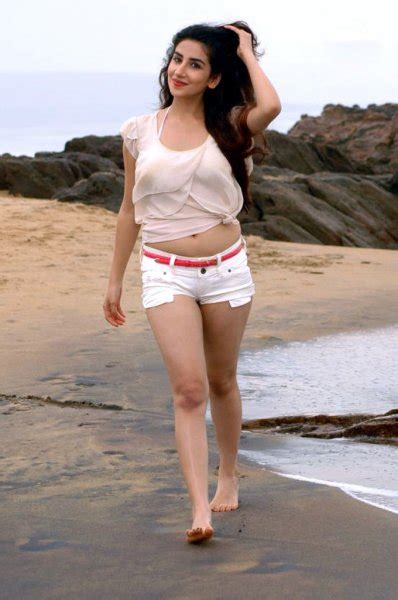 Parul Gulati Latest Spicy White Dress Stills On Beach Beautiful Indian