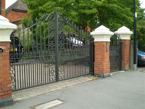 Are you looking for an automatic gate opener for your driveway gate? Wrought Iron Estate & Driveway Gates | Titan Forge Ltd
