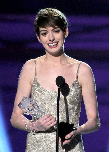 actress anne hathaway accepts the best supporting actress award for les miserables onstage at