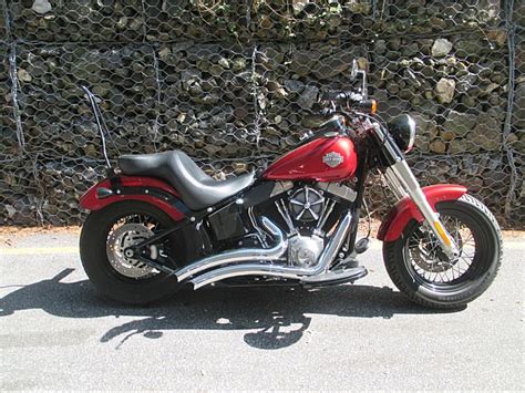 This 2012 lightweight bobber features a powerful. 2012 Harley-Davidson® FLS Softail® Slim™ (Ember Red Sunglo ...
