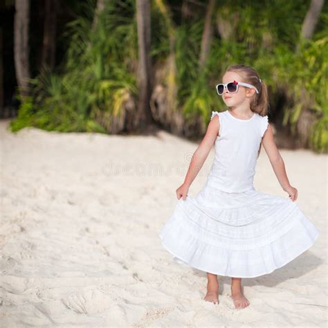 Adorable Little Girl On Tropical Beach Vacation In Stock Photo Image