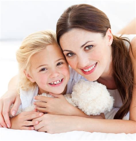 premium photo portrait of a joyful mother and her daughter